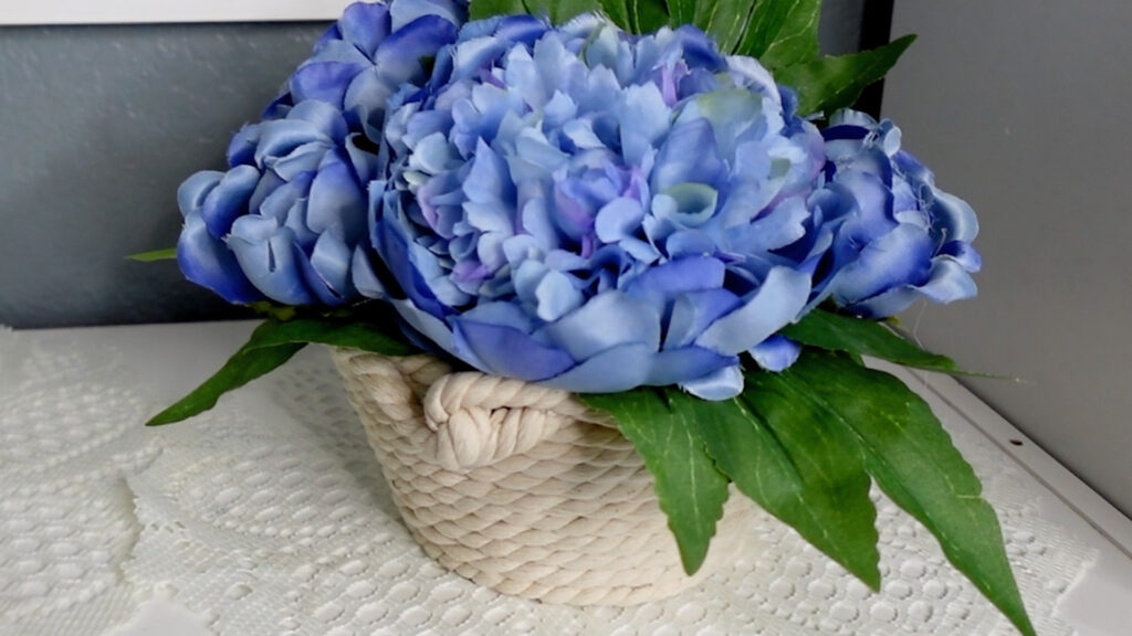 rope vase with flowers